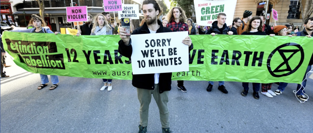 Seven climate change protesters have been arrested in Brisbane after blockades on Monday morning but the activist group still plans to disrupt traffic again within days.